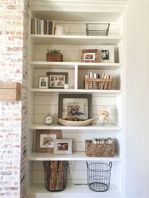 Built-in bookshelves styling and decor, shiplap, whitewash brick fireplace, rustic mantle ...