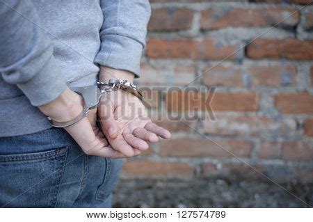 Man Arrested Handcuffs Image & Photo (Free Trial) | Bigstock