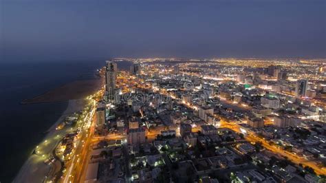 Cityscape of Ajman from Rooftop Day To Night Timelapse. Ajman is the ...