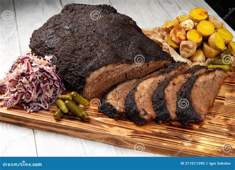 Traditional Smoked Barbecue Wagyu Beef Brisket As Piece and Sliced Offered Stock Photo - Image ...