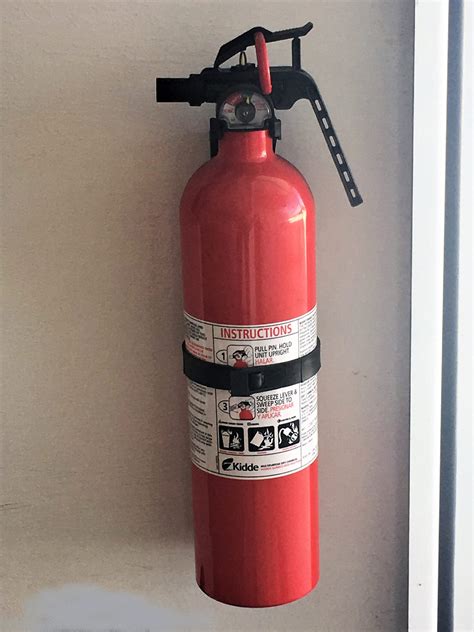 Fire Extinguisher with wall mount holder $30.00 - Super Lawn Trucks