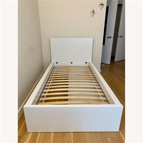 IKEA Malm White Twin Bed with 2 Storage Boxes - AptDeco