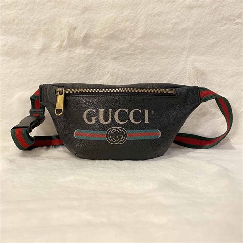 Shop authentic Gucci Logo Print Leather Small Belt Bag at revogue for ...