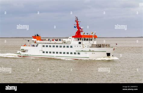 a ferry in the North Sea near Spiekeroog in East Frisia Stock Photo - Alamy