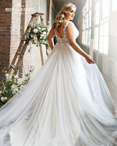 The ethereal Iris gown was designed for the bride who knows that LOVE is her power & she ...