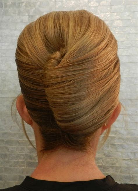 French twist UPDO with bangs. Check out my board for more hairstyles ...