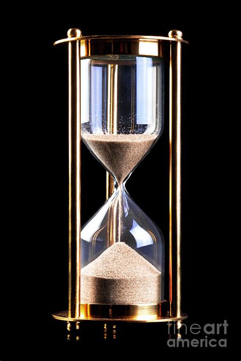 Hourglass Sand Timer On Black Photograph by Richard Thomas