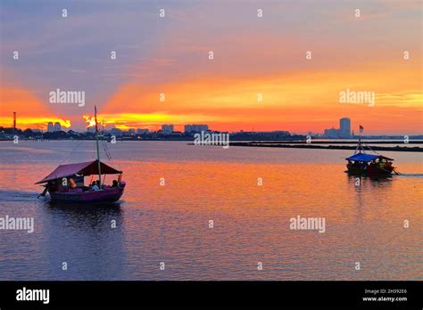 Sunset Pantai Ancol Beach, Jakarta, Indonesia Stock Photo - Alamy