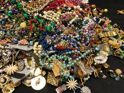 LARGE LOT OF COSTUME JEWELRY - Able Auctions