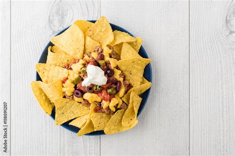 Beef nachos with jalapeno, olives, tomato, beans cheddar cheese Stock ...