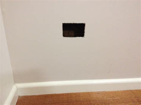 How to repair a power point hole in a plaster wall ready for painting. | TMZ Painting