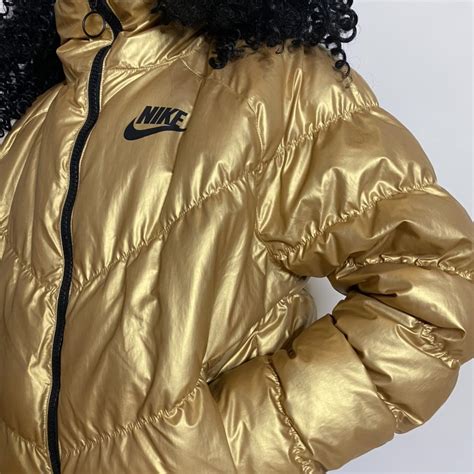 Gold Nike puffer jacket Size small - Depop