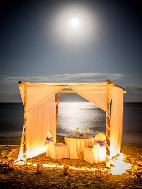 Romantic dinner set up on the beach. | Romantic dinner setting, Beach dinner, Romantic beach