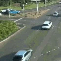 Hilarious Car Driving Fast Across High Way GIF | GIFDB.com