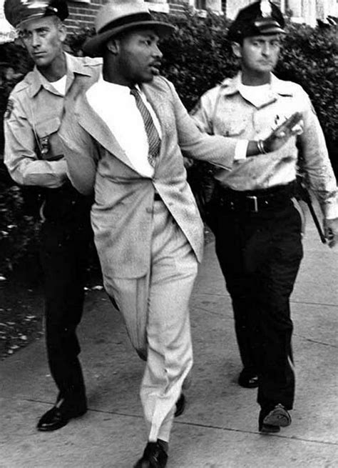 A photo of Martin Luther King Jr being arrested in 1964 for trying to ...