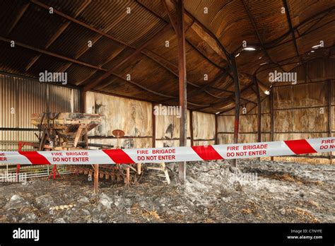 Scene of a barn fire, showing heat damage to steel girders and roof Stock Photo - Alamy