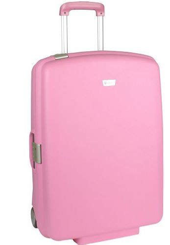 Pink luggage on wheels with a silver handle. | Pink luggage, Pink ...