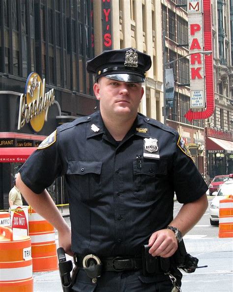 NYPD officer in Times Square after helping tourists with directions ...