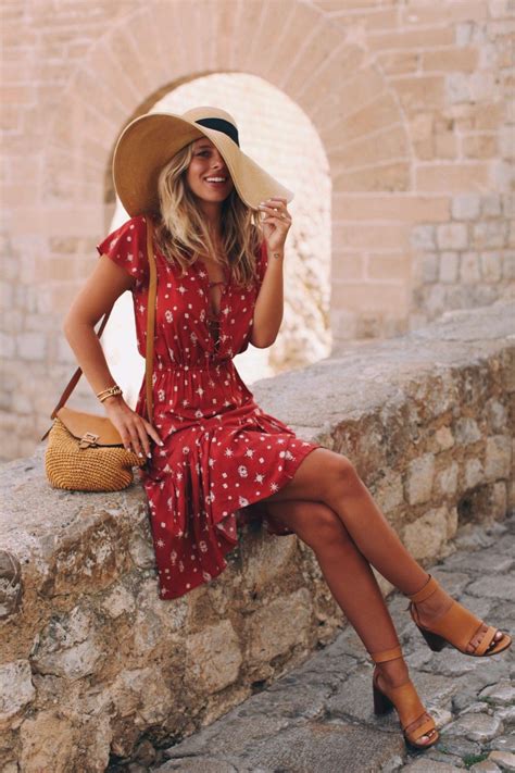 I love this red floral dress. It’s blousy at the top, fitted at the waist, with a flirty skirt ...