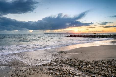 Premium Photo | Solent beach sunset