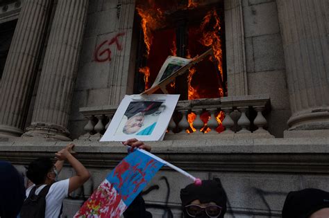 Protesters in Guatemala Set Fire to Congress Building Over Spending Cuts - The New York Times