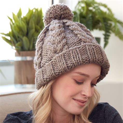 Bernat Cozy Cable Knit Hat Pattern | Yarnspirations | Knitted hats ...