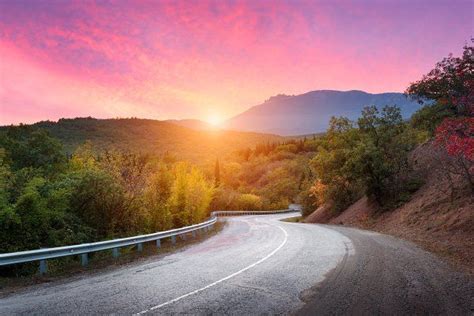 Mountain road at sunset stock photo containing landscape and road ...