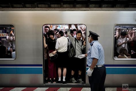 Tokyo Olympics: Getting around as tough as landing a ticket — AP Photos