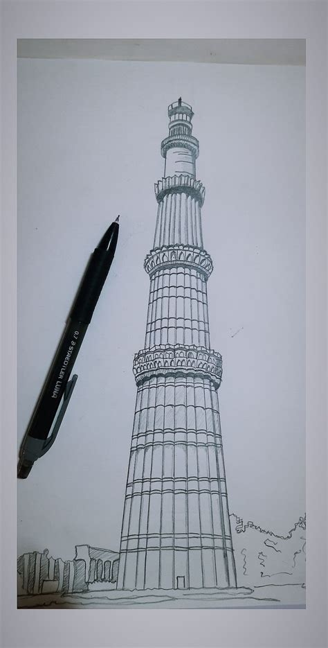 a drawing of a lighthouse with a pen on it