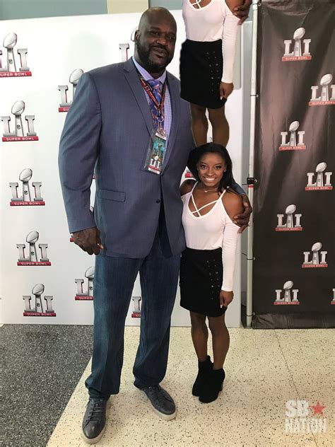 This photo of Shaq standing next to Simone Biles is a real-life ...