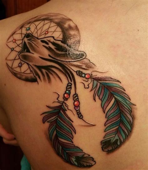 Wolf in a dream catcher tattoo, on the shoulder blade. Done by moonlight tattoos | Wolf tattoos ...