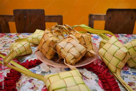 Ketupat food. Ketupat is made from woven young coconut leaves filled ...