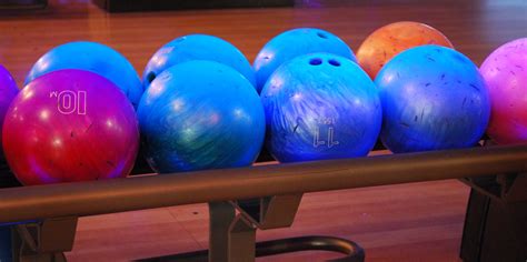 130 | Bowling balls glow neon in the black light. | Laura Nawrocik | Flickr