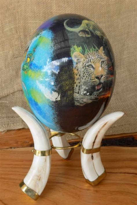 Big Five painted Ostrich egg with Warthog Tusk stand. | Ostrich, Warthog, Egg art