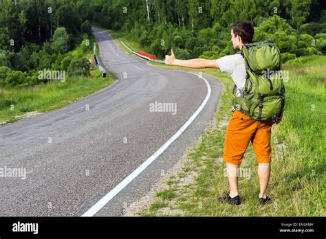 Man with backpack Stock Photo - Alamy