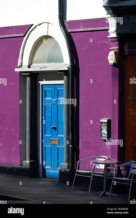 Old front door with arched window over, London street scene around ...