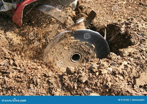 Tilling the Soil stock photo. Image of earth, roto, motion - 514102