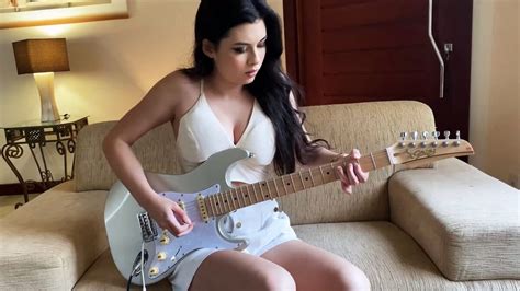 Who is Guitarist Larissa Liveir? - MusiciansTechHub