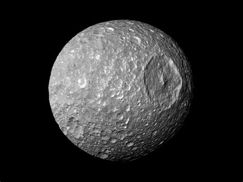 Bad Astronomy | Saturn's moon Mimas may have a liquid water ocean under ...