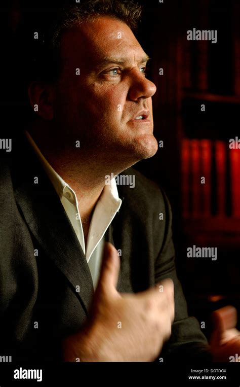 Bryn Terfel Jones CBE, the Welsh bass baritone Opera singer looking animated sitting in a ...