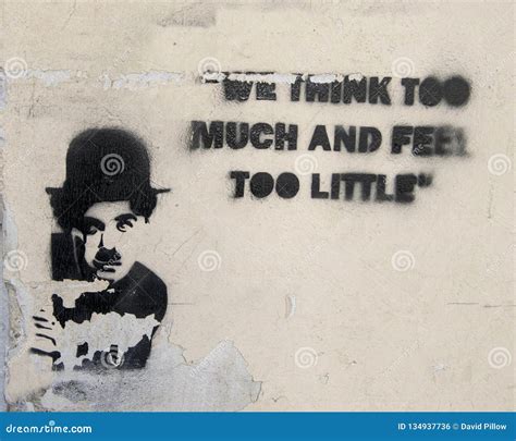 Tattered Graffiti With Image Charlie Chaplin And Part Of One Of His ...