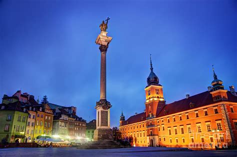 Old town in Warsaw Poland at night Photograph by Michal Bednarek