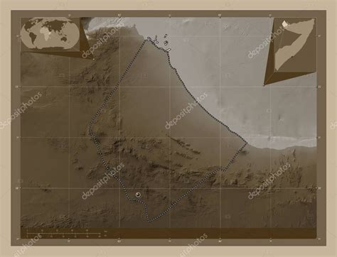 Awdal, region of Somalia. Elevation map colored in sepia tones with lakes and rivers. Corner ...