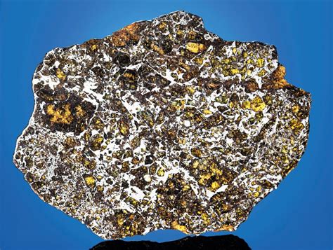 A COMPLETE SLICE OF ADMIRE METEORITE, Pallasite — PMGLyon County, Kansas | Christie’s