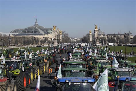 Farmers drive tractors to Paris to protest pesticide ban - The San Diego Union-Tribune