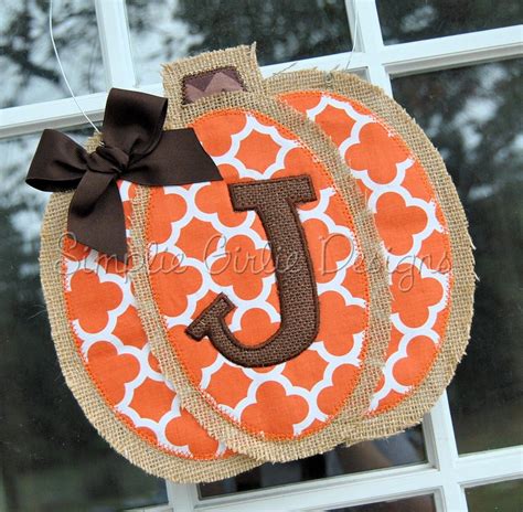 Burlap and quatrefoil fabric pumpkin door hanger with initial. Can customize. by ...