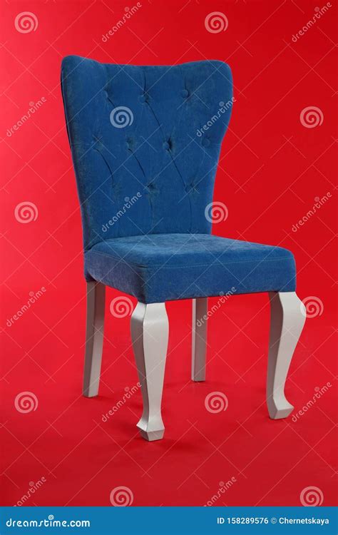 Stylish Blue Chair on Red . Element of Interior Design Stock Photo - Image of trend, decor ...