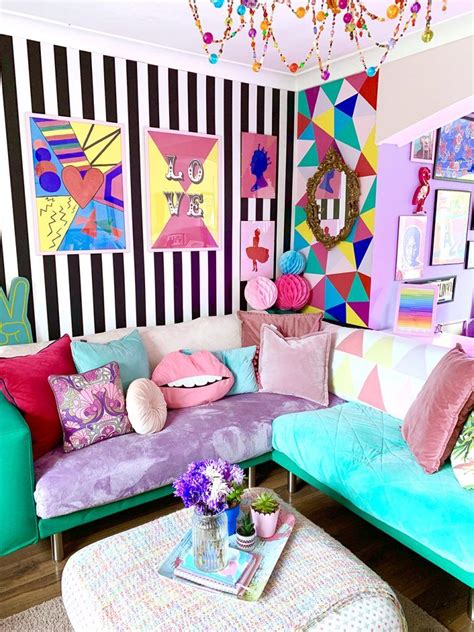 Crazy & colourful living room decor with monochrome stripy wallpaper and quirky colour pops ...