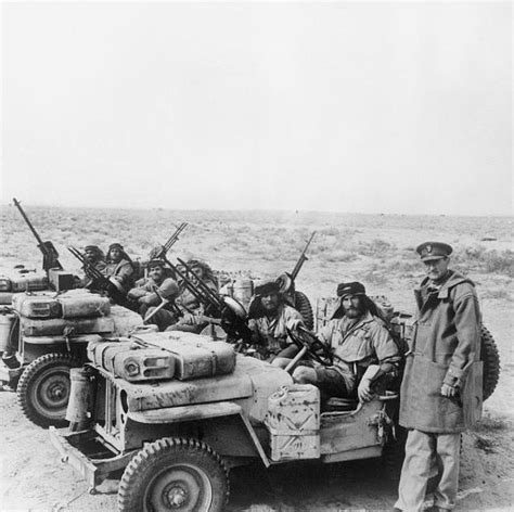 File:Colonel David Stirling, founder of the Special Air Service, with an SAS jeep patrol in ...