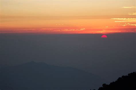 Tiger Hill , Sunrise @ 4 a.m. ,Pink rays of sun fall on mountains ...